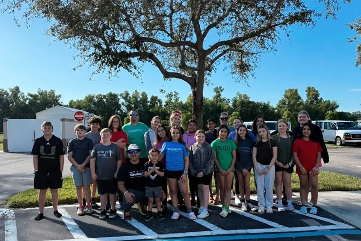 NLC students gathered outside the church for a group photo